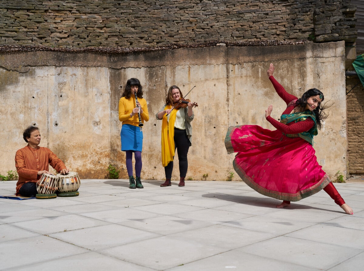 Roshni / Sonia Sabri Company - image of three musicians and dancer
